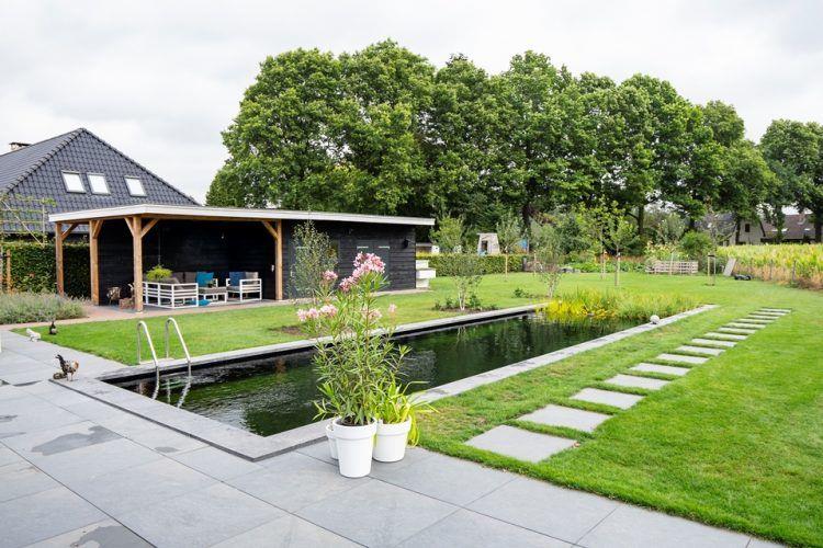 Landelijke-tuin-met-zwemvijver-en-overkapping-in-Diepenveen-vos-tuinvisie